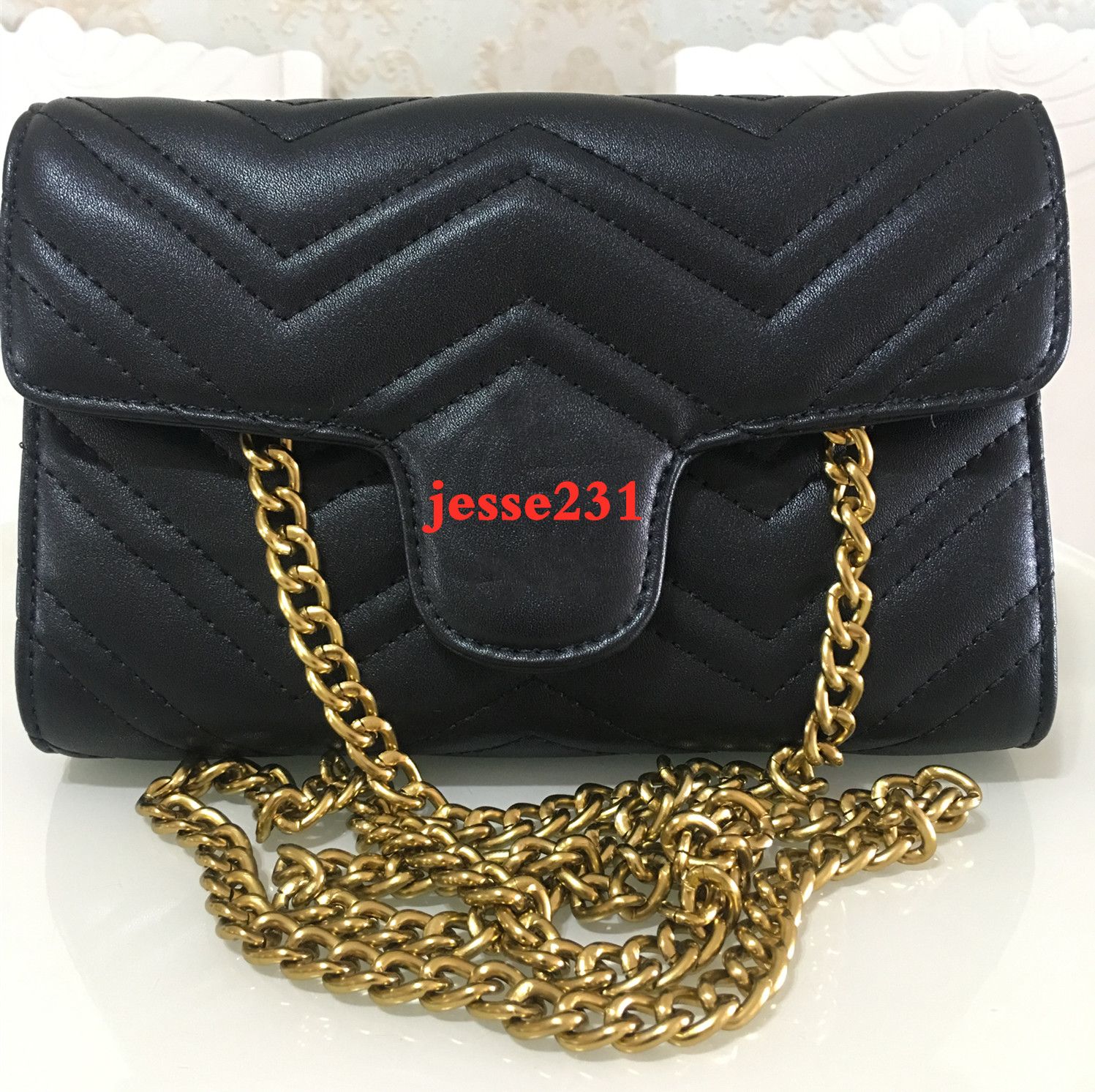 small gold bag with chain