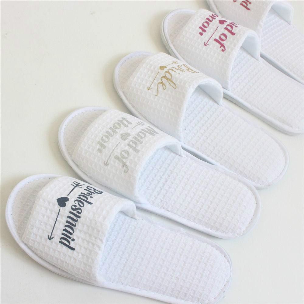 Witte open teen slippers