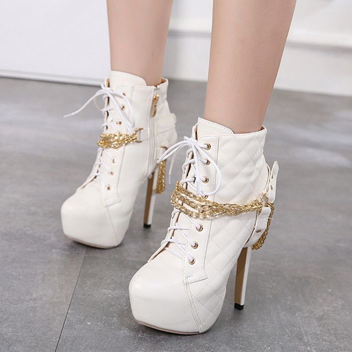 white shoes with gold chain