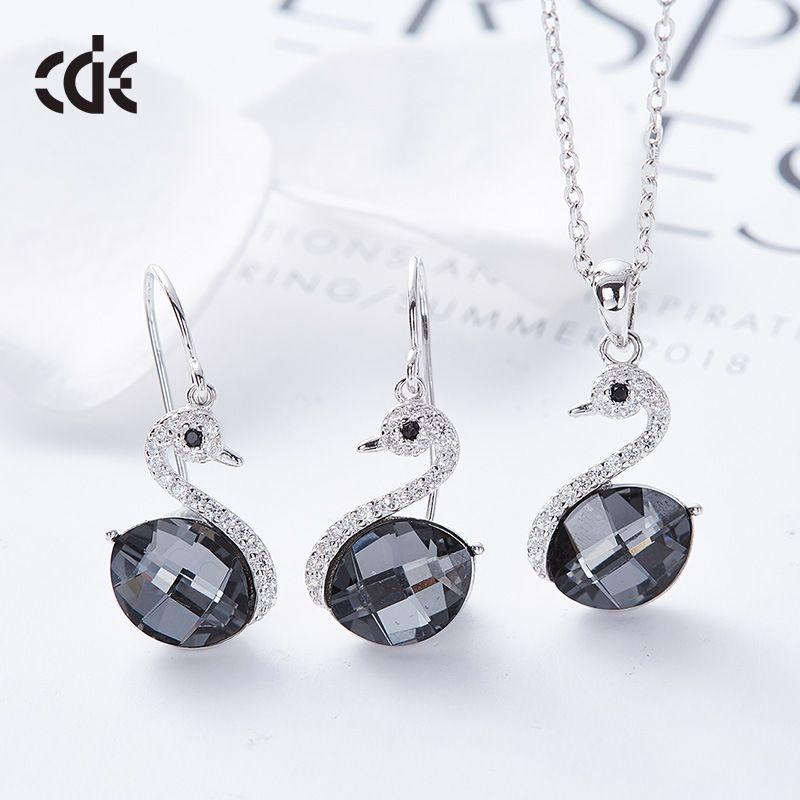 Southwest The Hotel receiving swarovski swan necklace and earring set