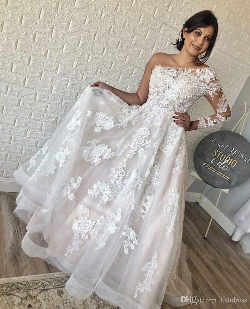 one shoulder long sleeve wedding dress