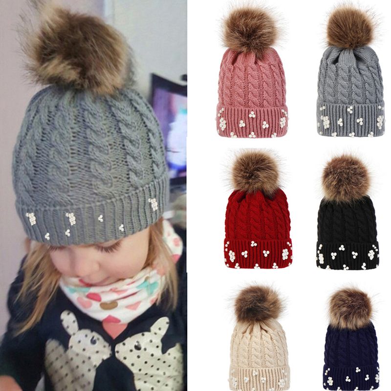 STUNNING WINTER WOOL CAP HAT WITH STUDS PEARLS AND POMPON.
