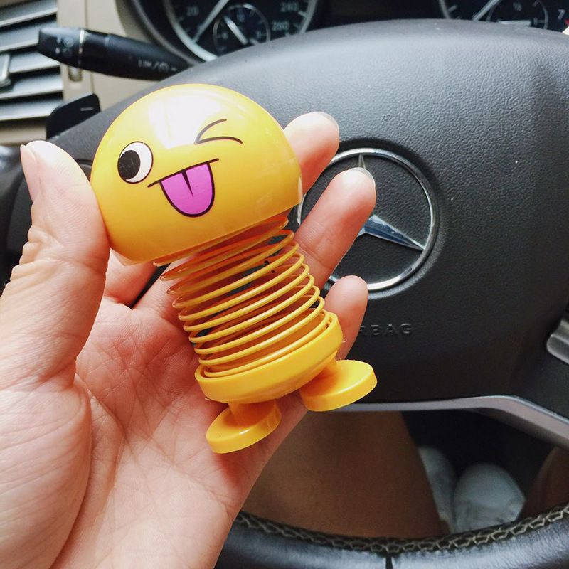 smiling face spring doll