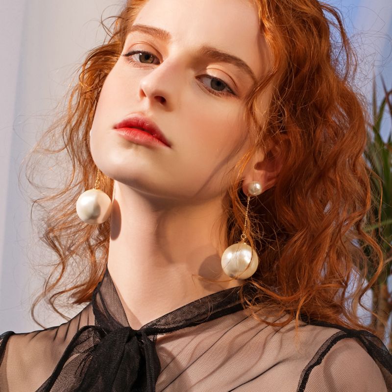 huge pearl earrings