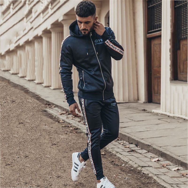 Los hombres de conjunto gimnasio pantalones de camiseta de manga larga apretado Conjunto de deporte hombres camisetas de culturismo y Fitness ropa 