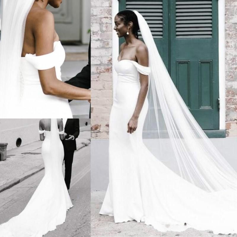 white satin fitted wedding dress