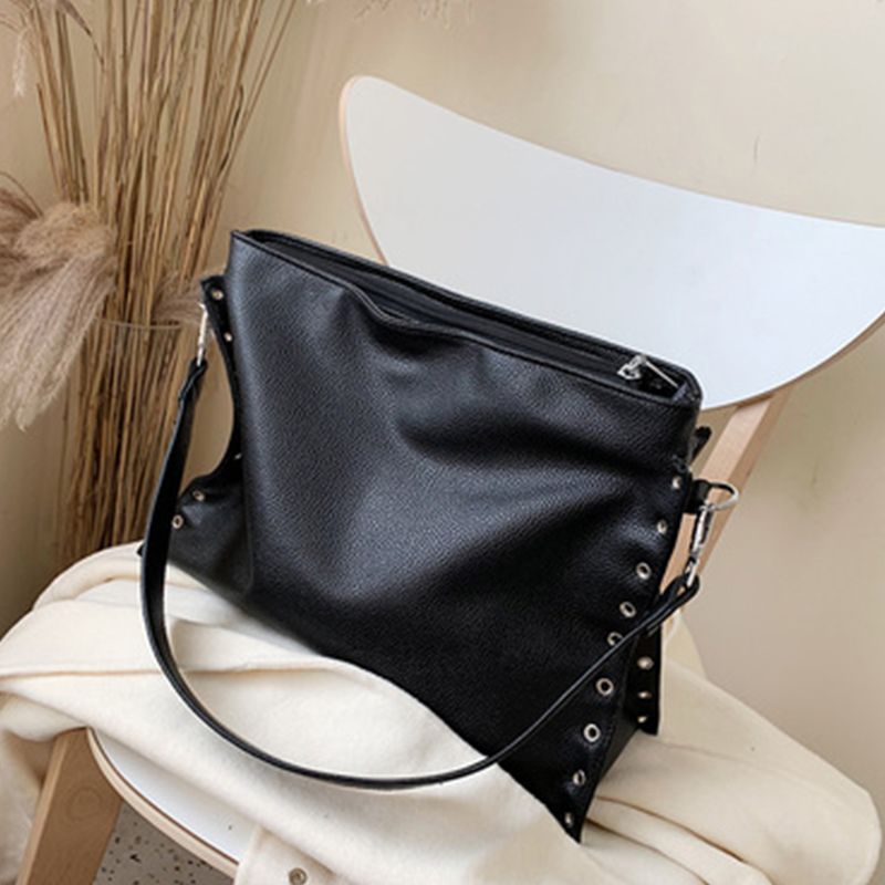 large purse with shoulder strap