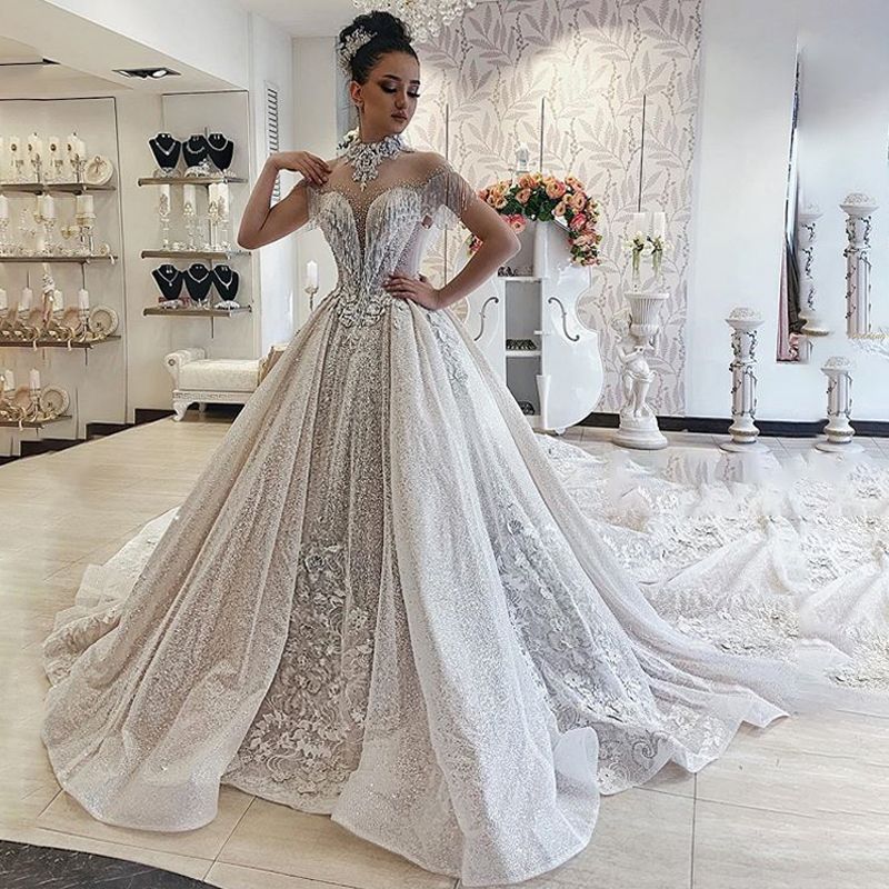 Compra Vestido De Bola Con Lentejuelas Brillante Vestidos De Novia Sheer  Cuello Capilla Capilla Vestido De Boda Train Abric Dubai Princess Vestidos  Nupciales Barato | Entrega Rápida Y Calidad | Es.Dhgate