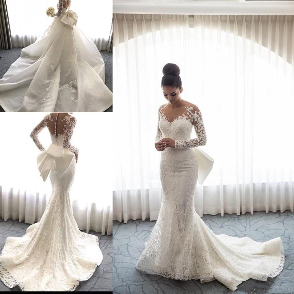 peplum wedding dress with lace sleeves