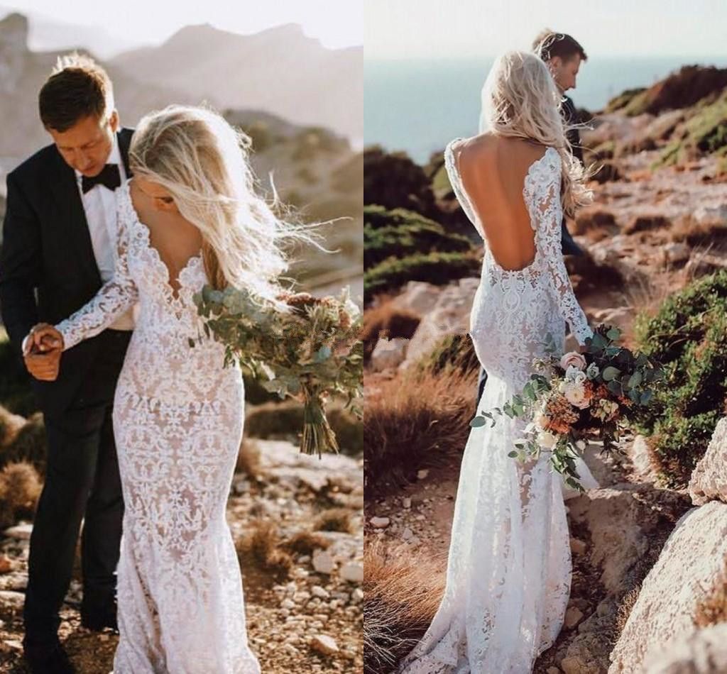 long sleeve lace open back mermaid wedding dress