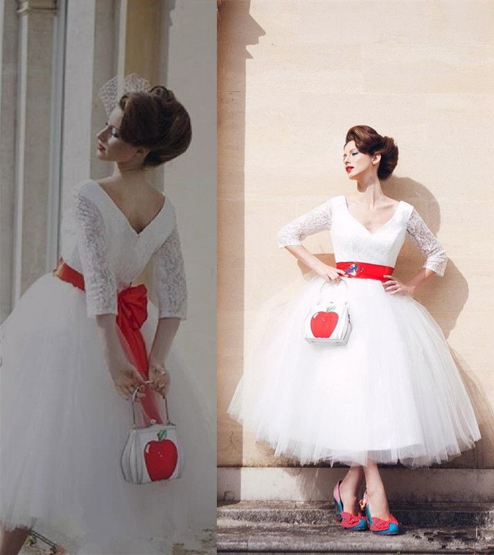 white wedding dress with red sash