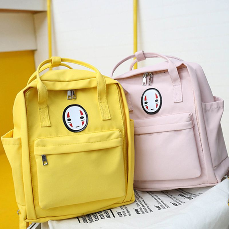 yellow jansport big student backpack