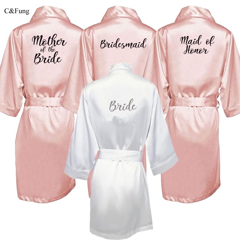 bathrobe bride and bridesmaid