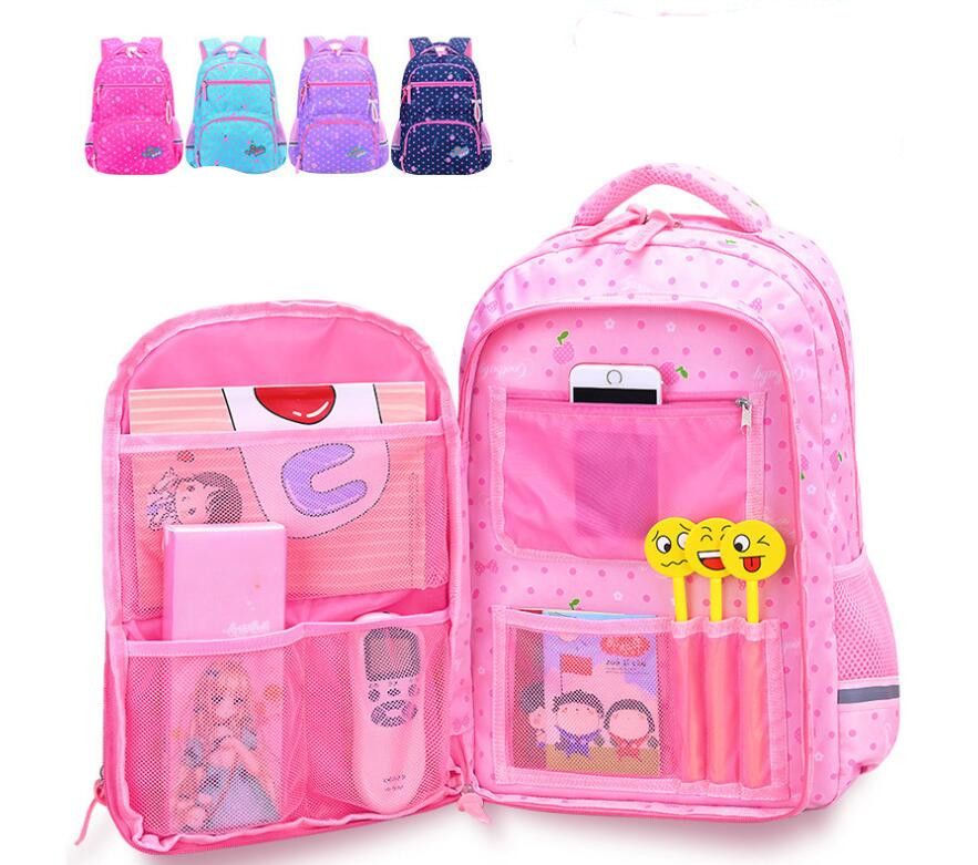 Nueva mochila para los estudiantes de primaria en el primer grado tres - cuatro - seis