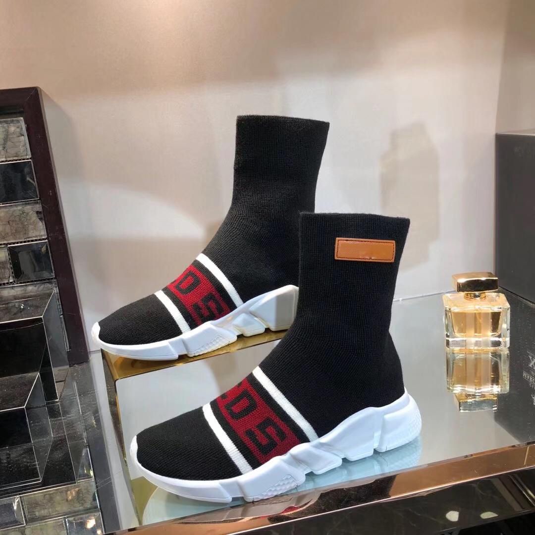 Sneakers alte di tela nere e bianche di Gcds, €130 | farfetch.com |  Lookastic