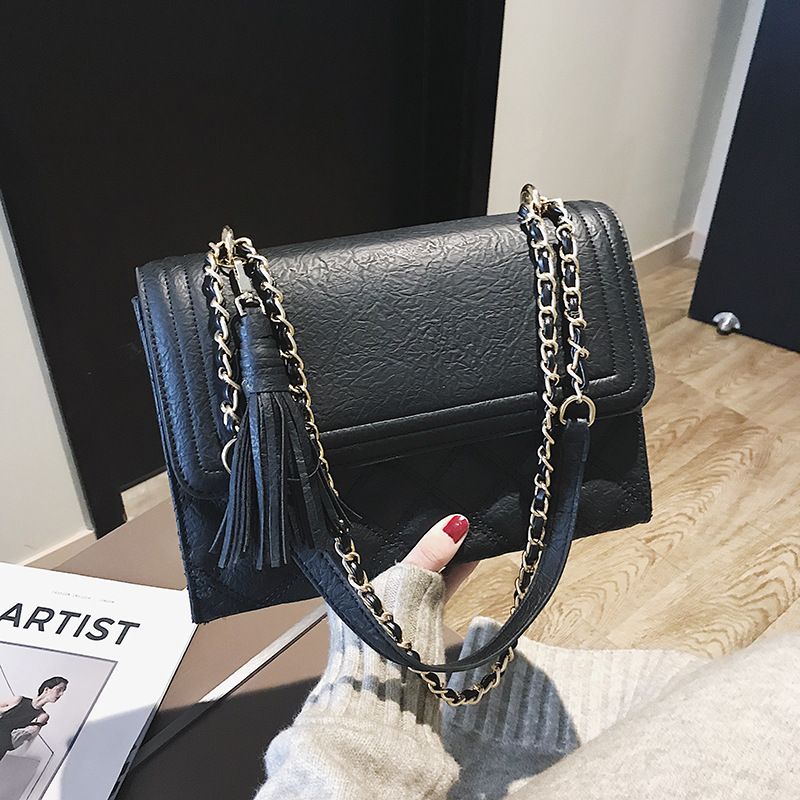 small black bag with silver chain