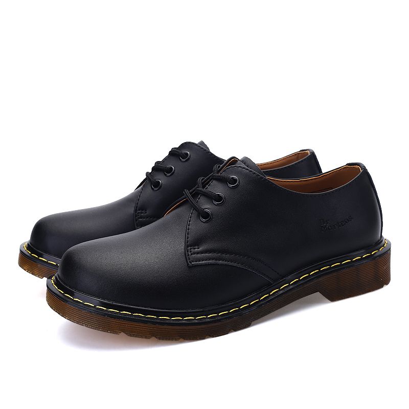 brown low top doc martens