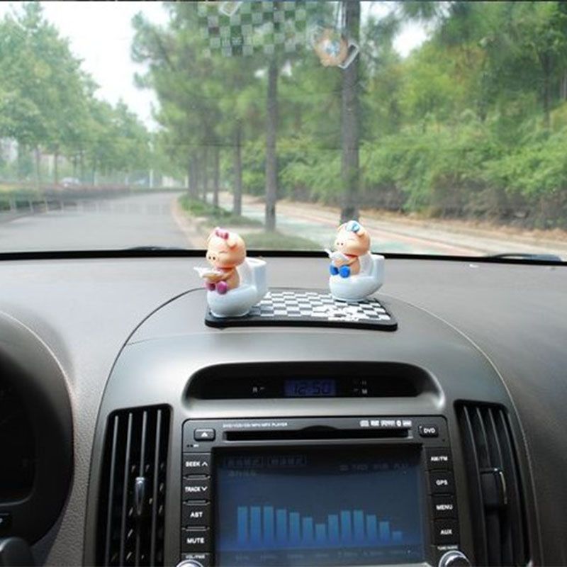 car dashboard doll