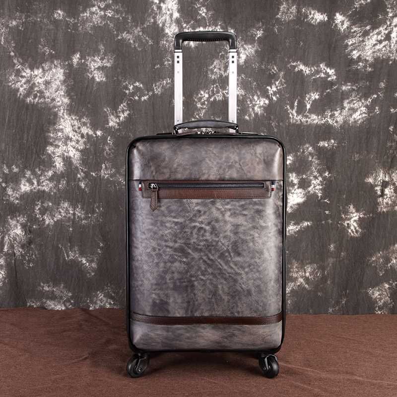 leather luggage with wheels