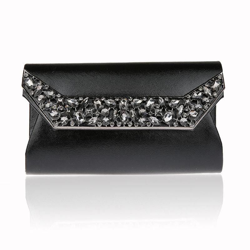 black evening bag with gold chain