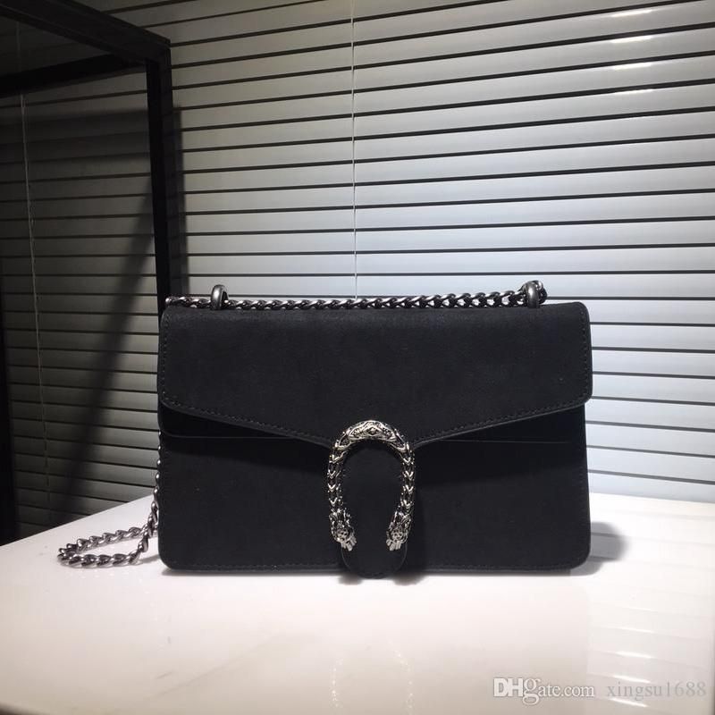 crossbody bag with embossed chain