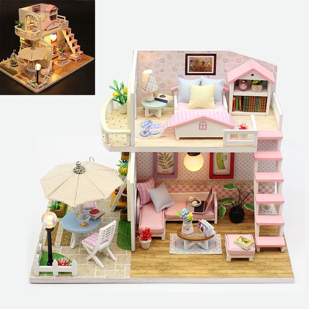 small wooden dolls house