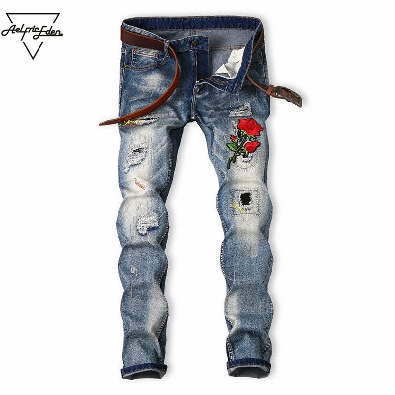 floral embroidered ripped design jeans