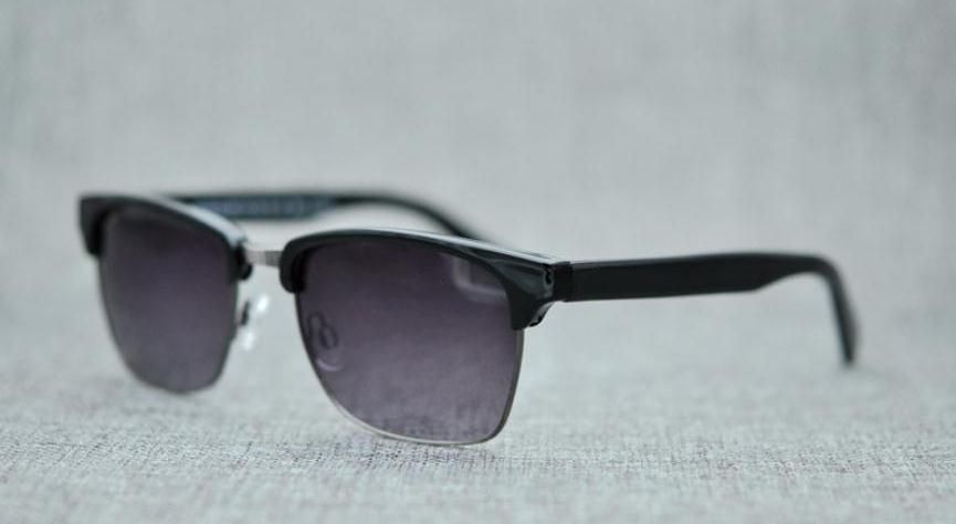 Black frame purple grey lens