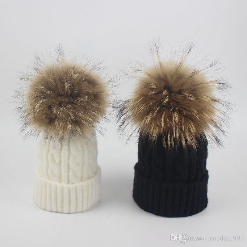 hat with fur ball on top