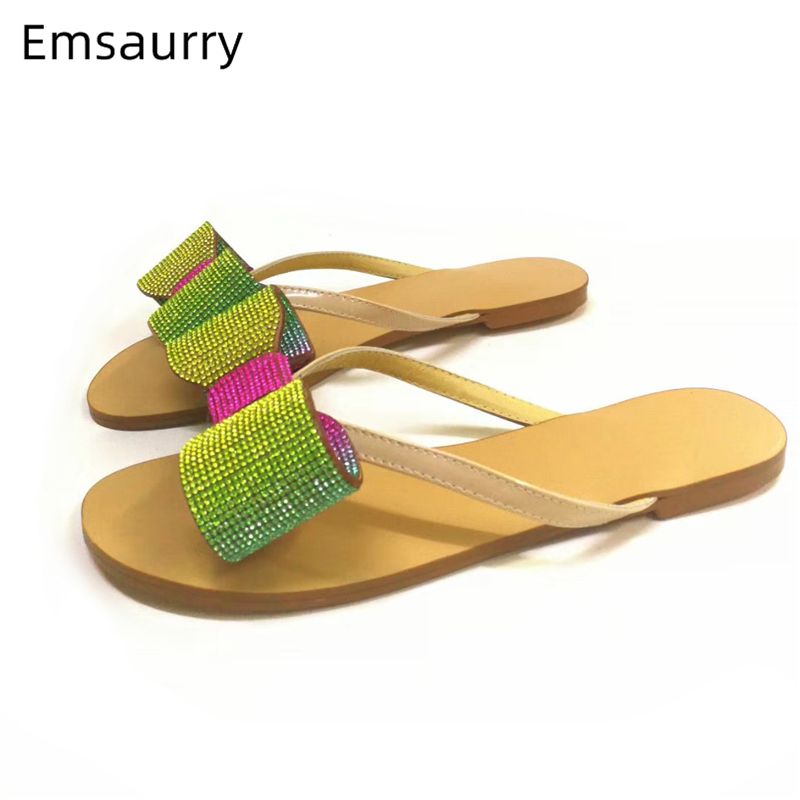 white jeweled flip flops