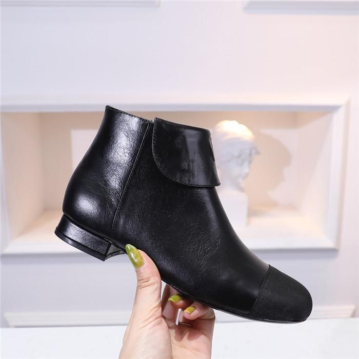 designer flat ankle boots