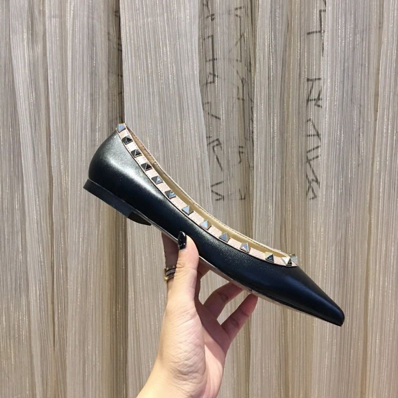 designer pointed toe flats