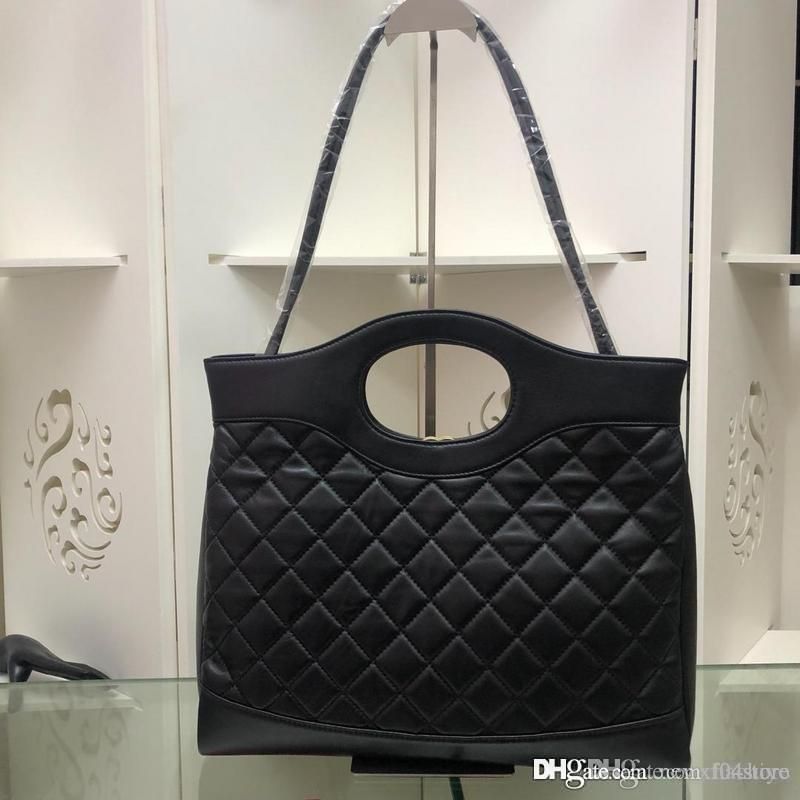 black and gold designer bag