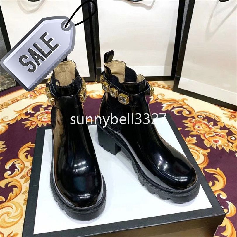 embroidered leather ankle boot with belt