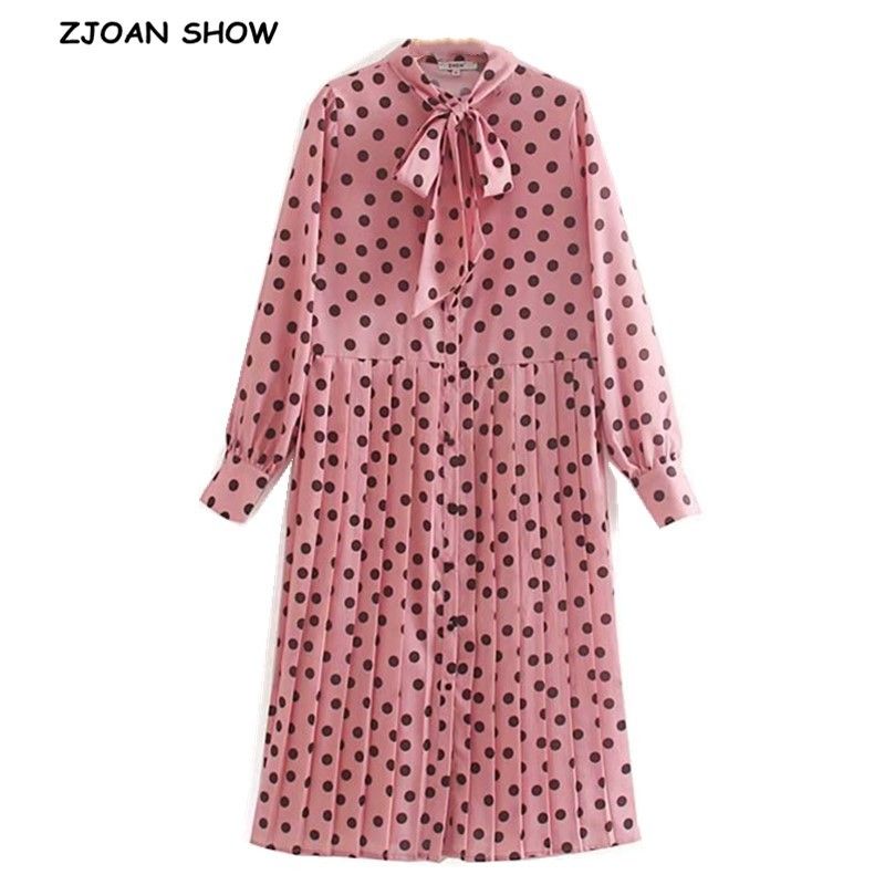 pink and black polka dot dress