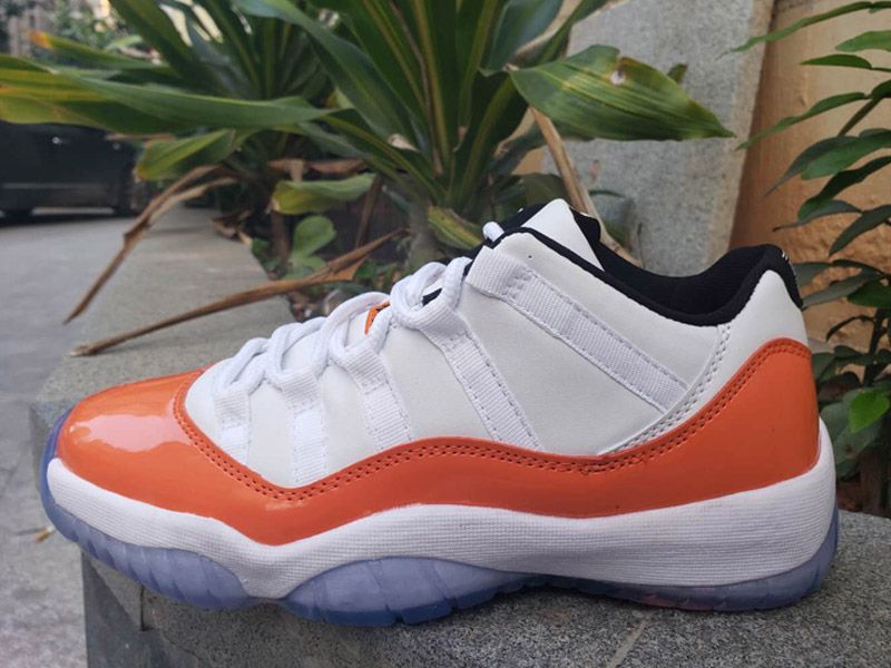 air jordan 11 low wmns orange trance