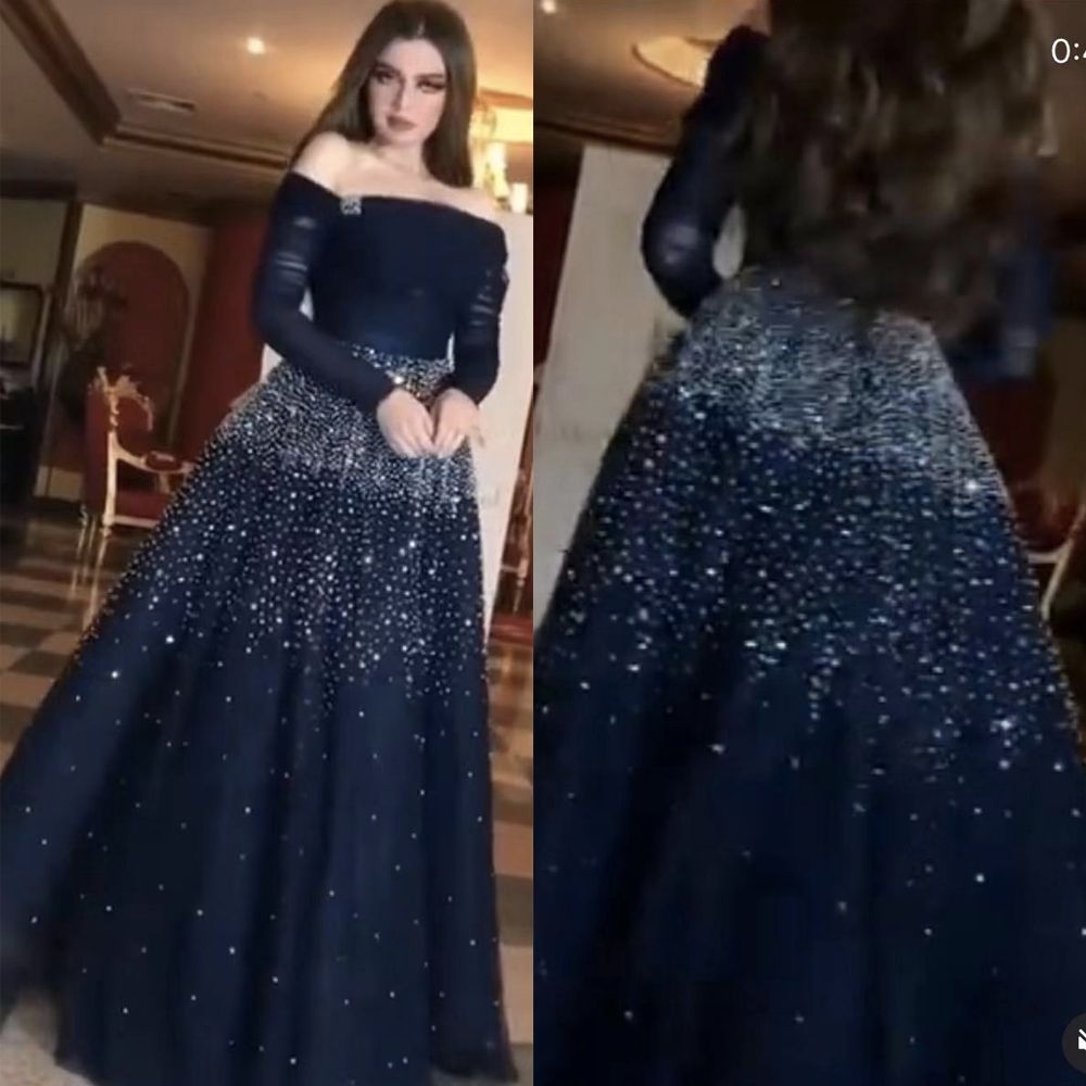 off the shoulder long sleeve evening gown