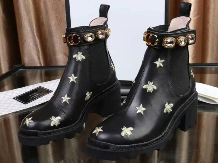 embroidered leather ankle boot with belt
