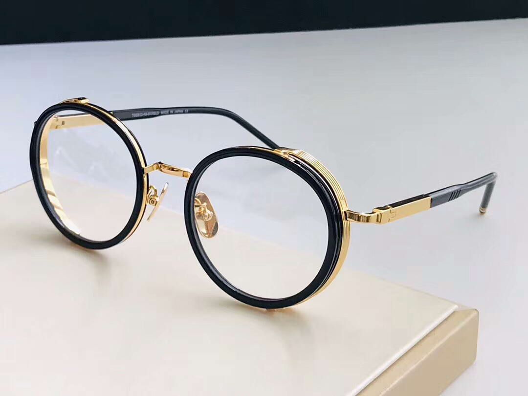 black and gold round frame sunglasses