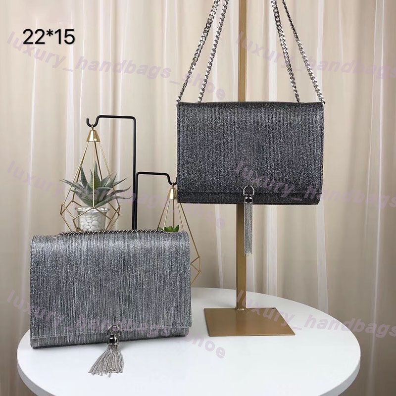 black side bag with silver chain