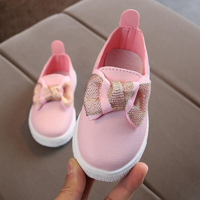 sneakers with pearl bow