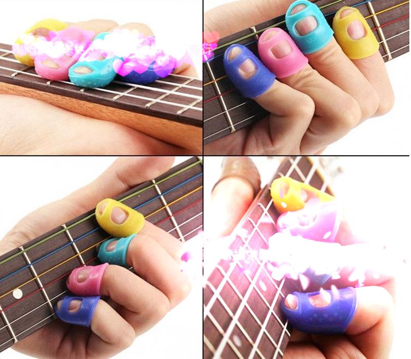 Compre O Melhor E O Mais Recente BRAND 4 Pçs / Set Guitarra Corda Protetor  De Dedo Protetor De Dedo Silicone Mão Esquerda Dedo Proteção Prensa  Acessórios Da Guitarra, Dimensões Opcionais. | DHgate.Com