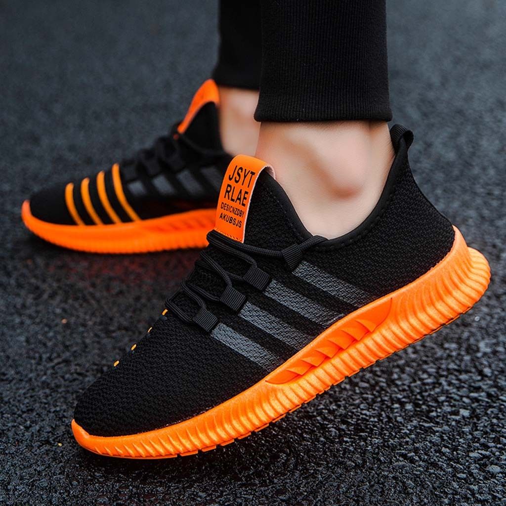 black and orange gym shoes