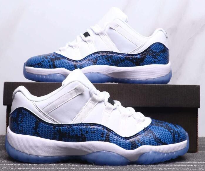 white and blue snakeskin 11s