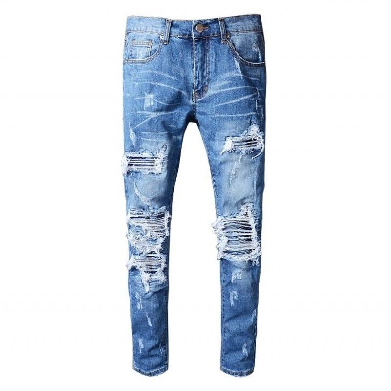 tight blue ripped jeans