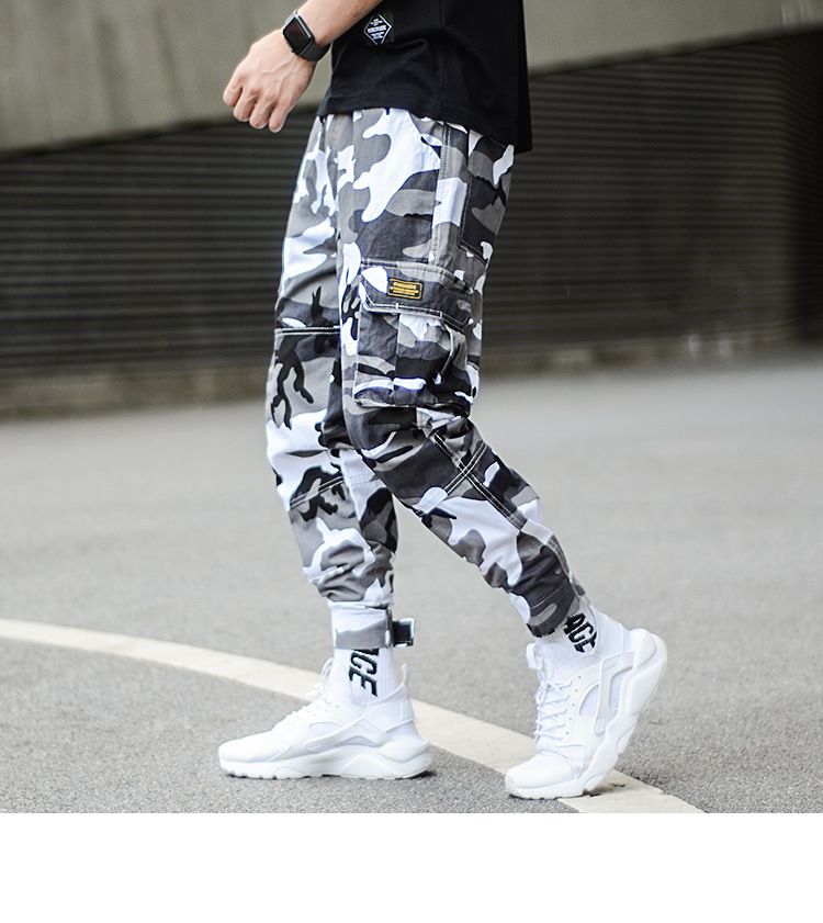 Compra 2019 Camuflaje De Moda Estilo Punk Hombres Jogger Pantalones Jóvenes  Streetwear Pantalones Vaqueros De Hip Hop Hombres Pantalones De Carga De  Gran Bolsillo Pantalones Harem Homme Barato | Entrega Rápida Y