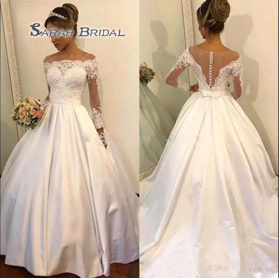 lace wedding dress with bow in back