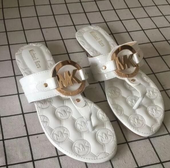 mk fluffy slippers