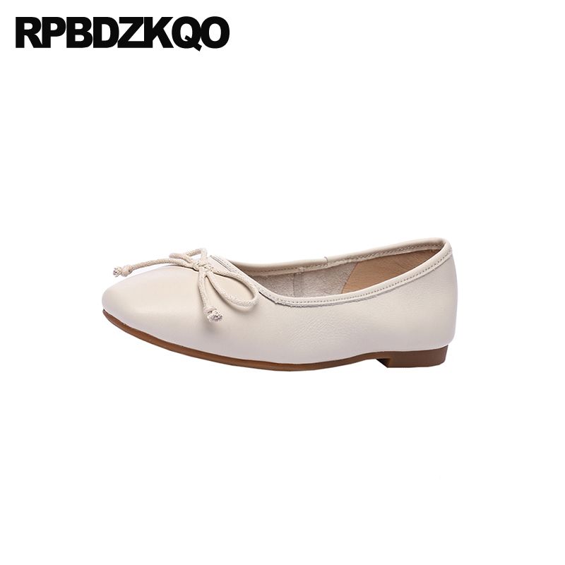 white slip on flats