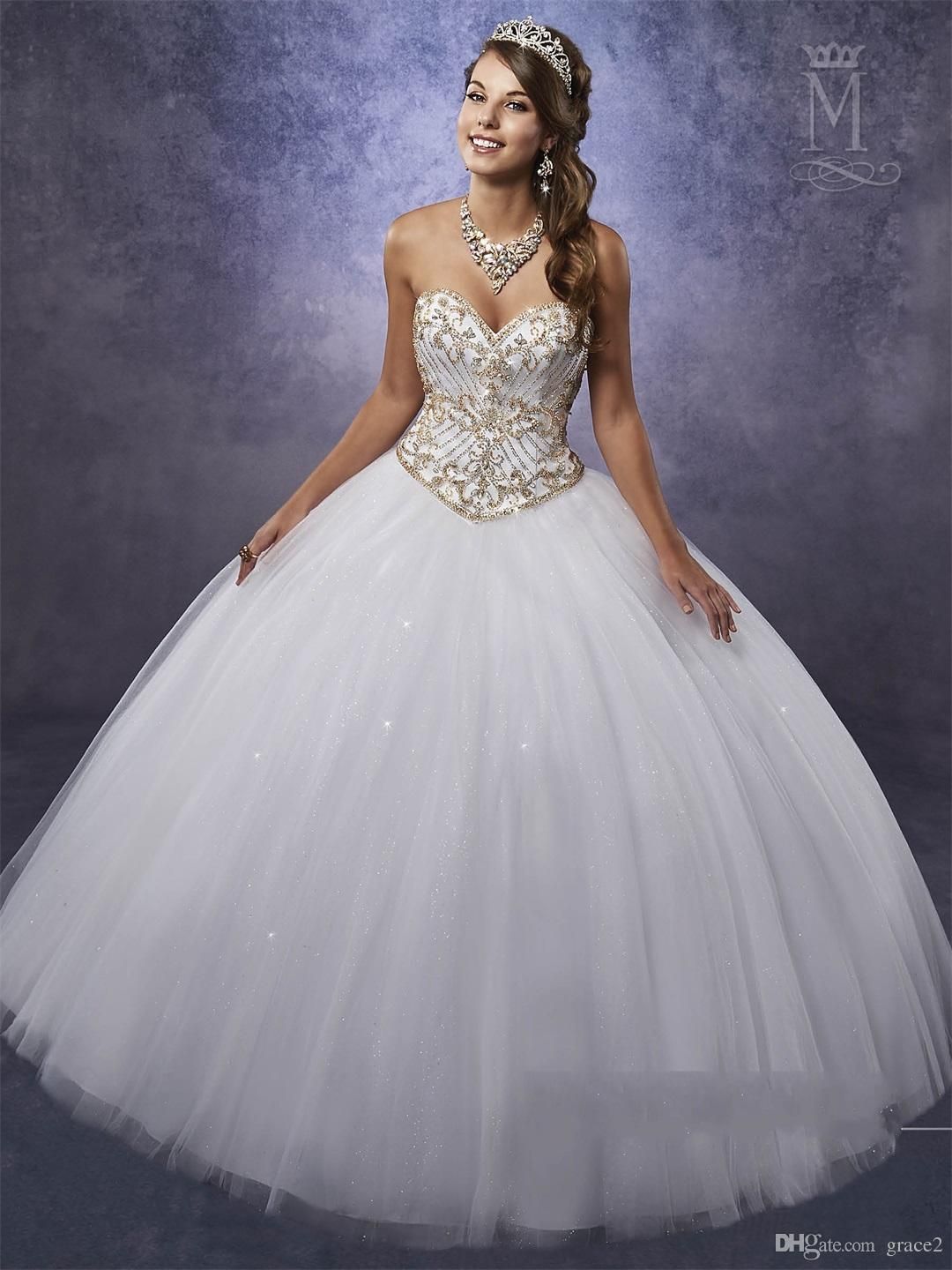 white and gold quinceanera dresses